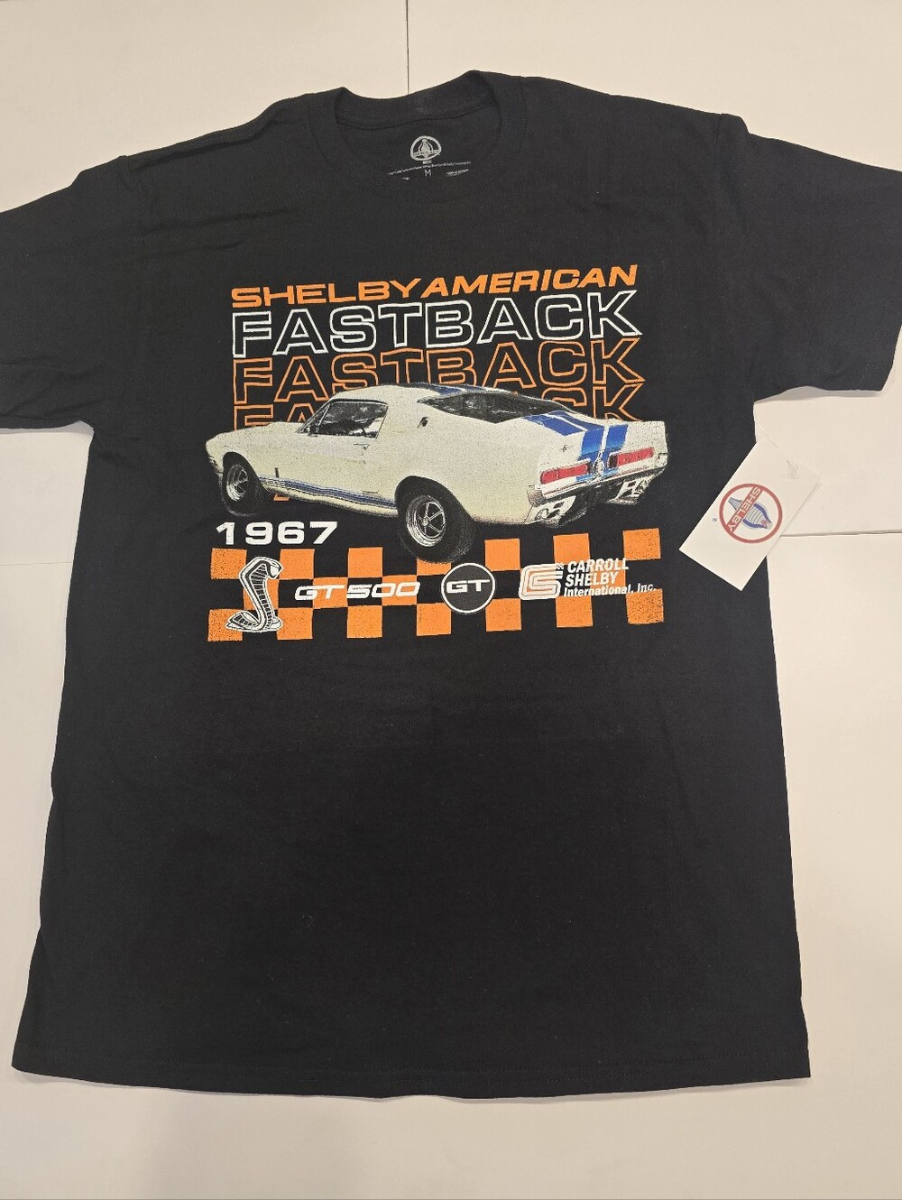 Shelby Black Fastback Graphic Tee with Orange and White Accents